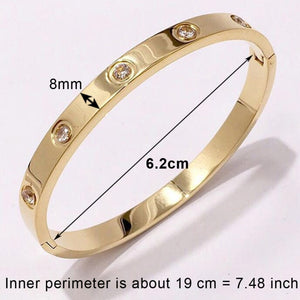 Trendy Titanium Gold Crystal Bangle - Two-One-Fifth Co.